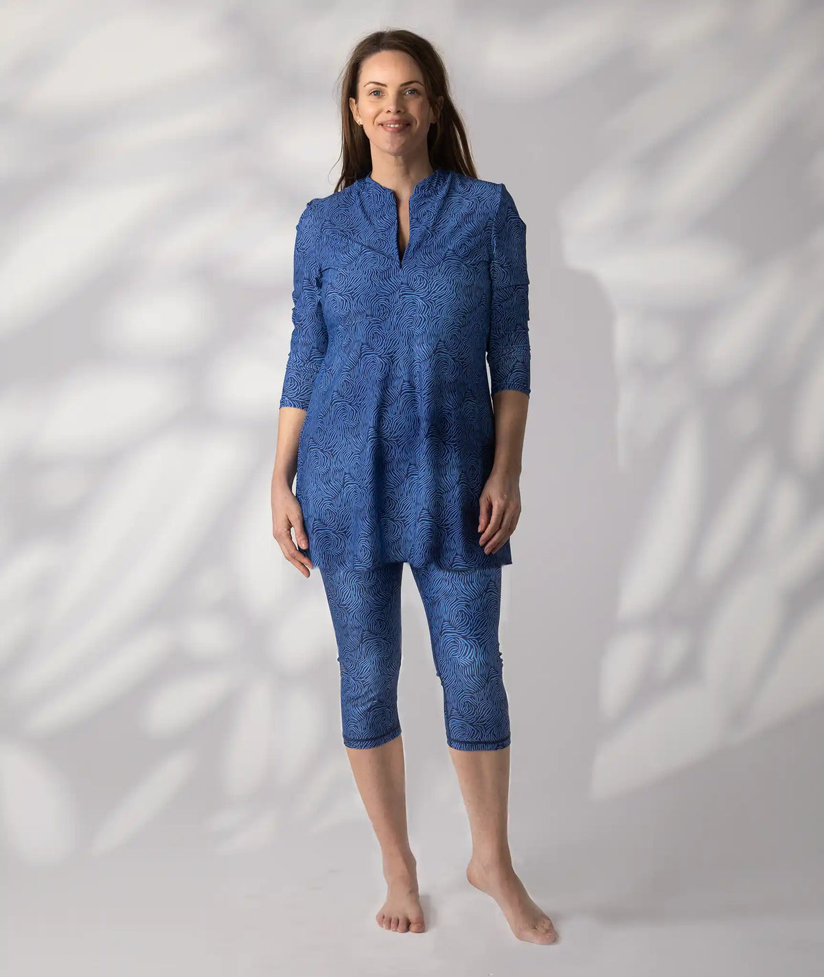 Three piece swim set in Saltwater Blue print: swim dress, leggings and crop top