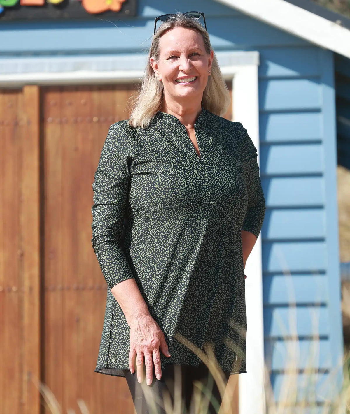 Suncheeter swim dress in Gone Dotty green spot print with long sleeves
